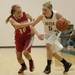 Dexter's Riley McDonald drives the ball against Canton's Reachel Winters during the second half the regional semifinal game at Novi High School Tuesday, Mar. 5th.
Courtney Sacco I AnnArbor.com  